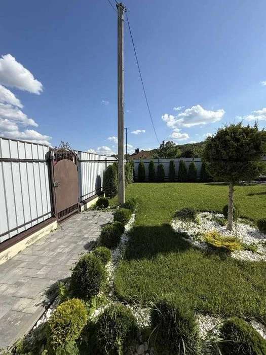 Просторий будинок 130 м² біля річки, гараж на 2 авто, 13 сот
