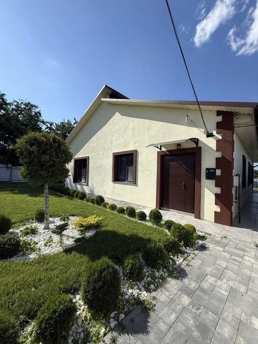 Просторий будинок 130 м² біля річки, гараж на 2 авто, 13 сот