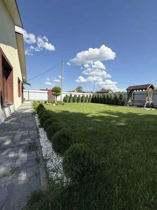 Просторий будинок 130 м² біля річки, гараж на 2 авто, 13 сот