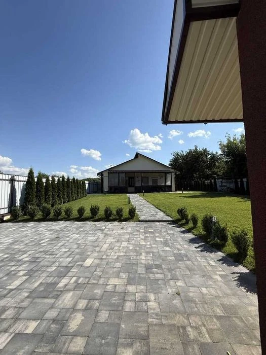 Просторий будинок 130 м² біля річки, гараж на 2 авто, 13 сот