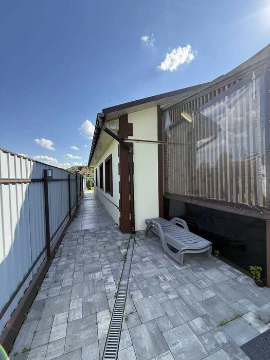 Просторий будинок 130 м² біля річки, гараж на 2 авто, 13 сот