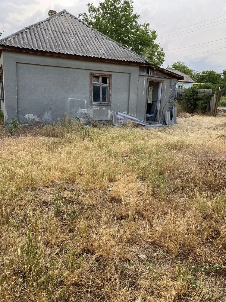 Продам 2 дома по 1/2 с гаражом и подвалом