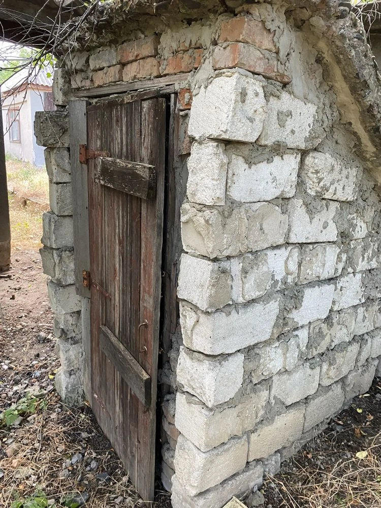 Продам 2 дома по 1/2 с гаражом и подвалом