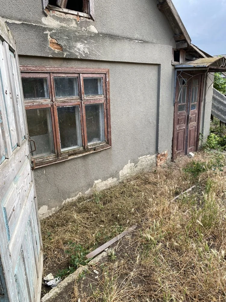 Продам 2 дома по 1/2 с гаражом и подвалом