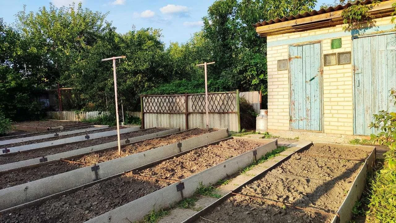 Терміновий продаж цегляного будинку в центрі Дергачів.