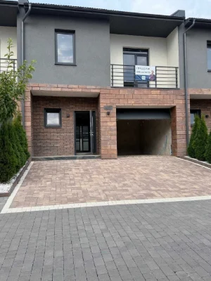 Townhouse for Sale with City Utilities + Garage