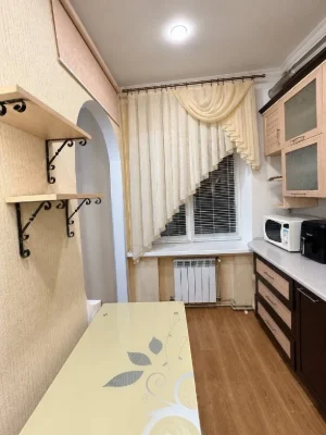 Sale of a 2-room apartment in the Stalinist style in the city center