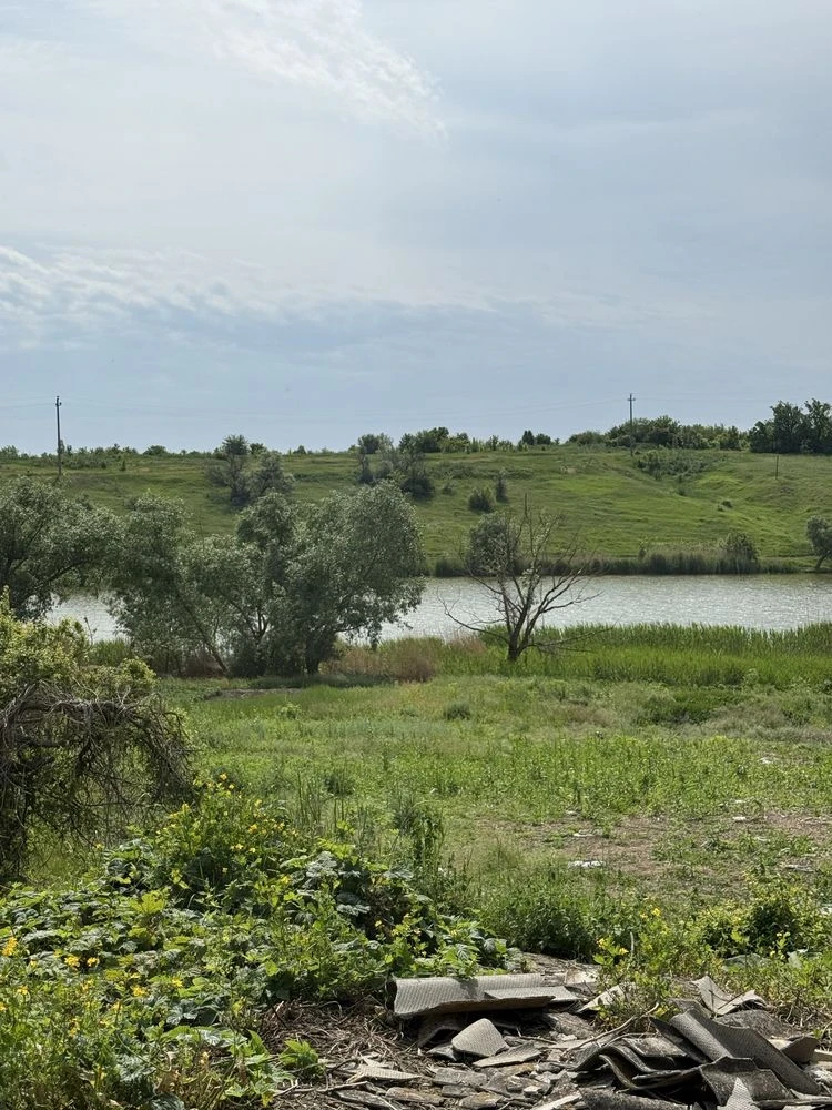 Продажа двох земельний ділянок біля ставка