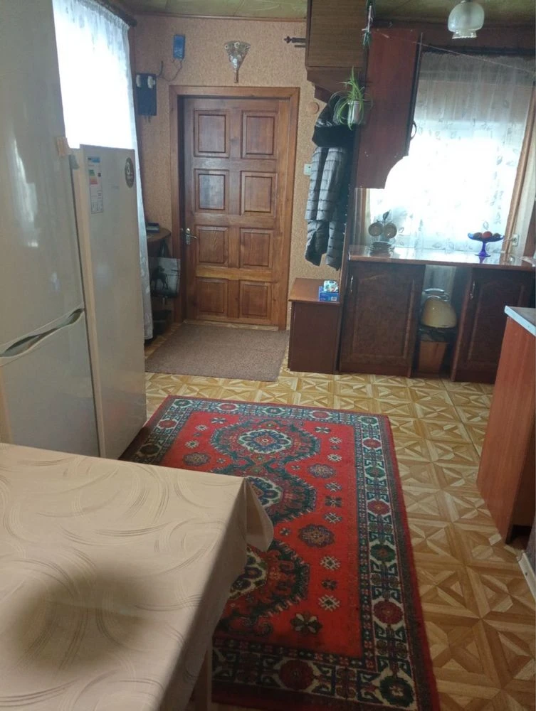 Продається частина будинку в центрі Зміїва
