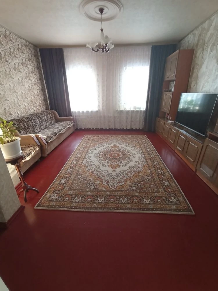 Продається частина будинку в центрі Зміїва