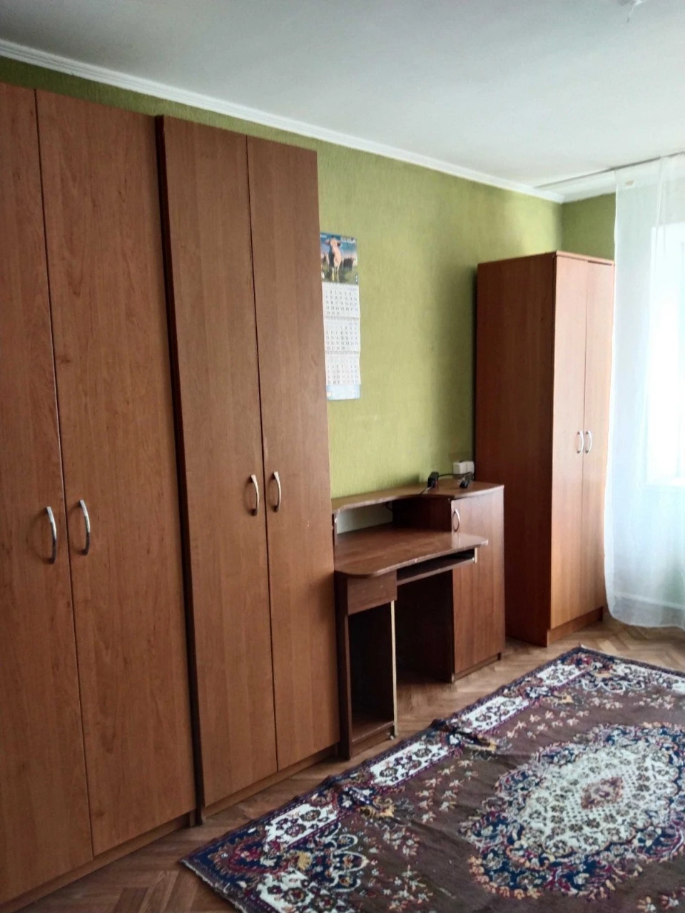 Кімната в сімейному гуртожитку