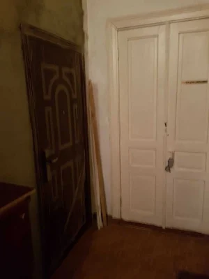 A room in a communal apartment with one neighbor