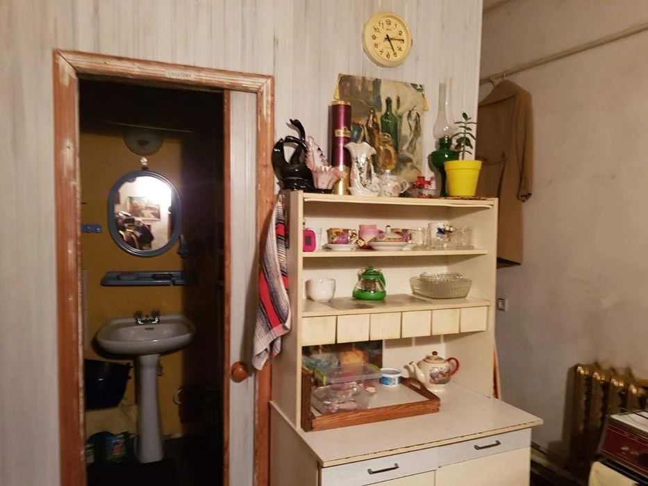 A room in a communal apartment with one neighbor