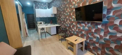 I am selling a small hotel room near the French Boulevard shopping center.