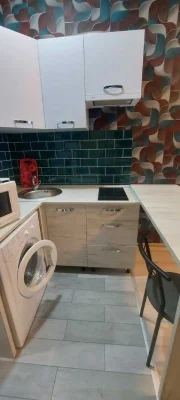 I am selling a small hotel room near the French Boulevard shopping center.