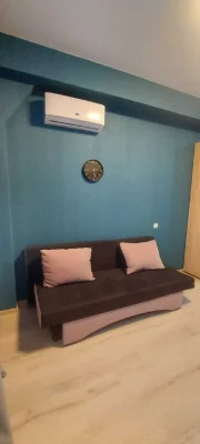 I am selling a small hotel room near the French Boulevard shopping center.