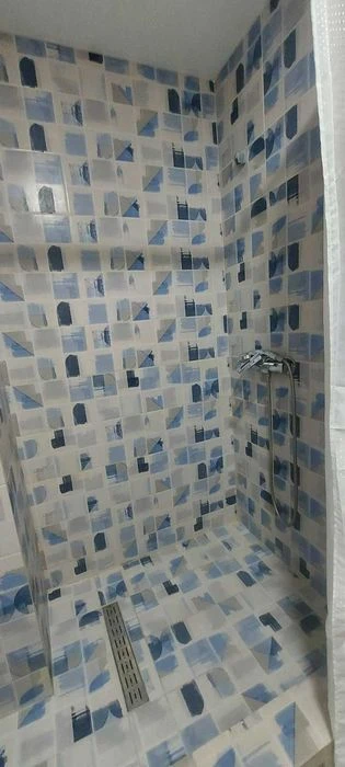 I am selling a small hotel room near the French Boulevard shopping center.