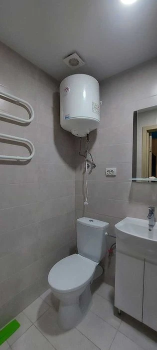 I am selling a small hotel room near the French Boulevard shopping center.