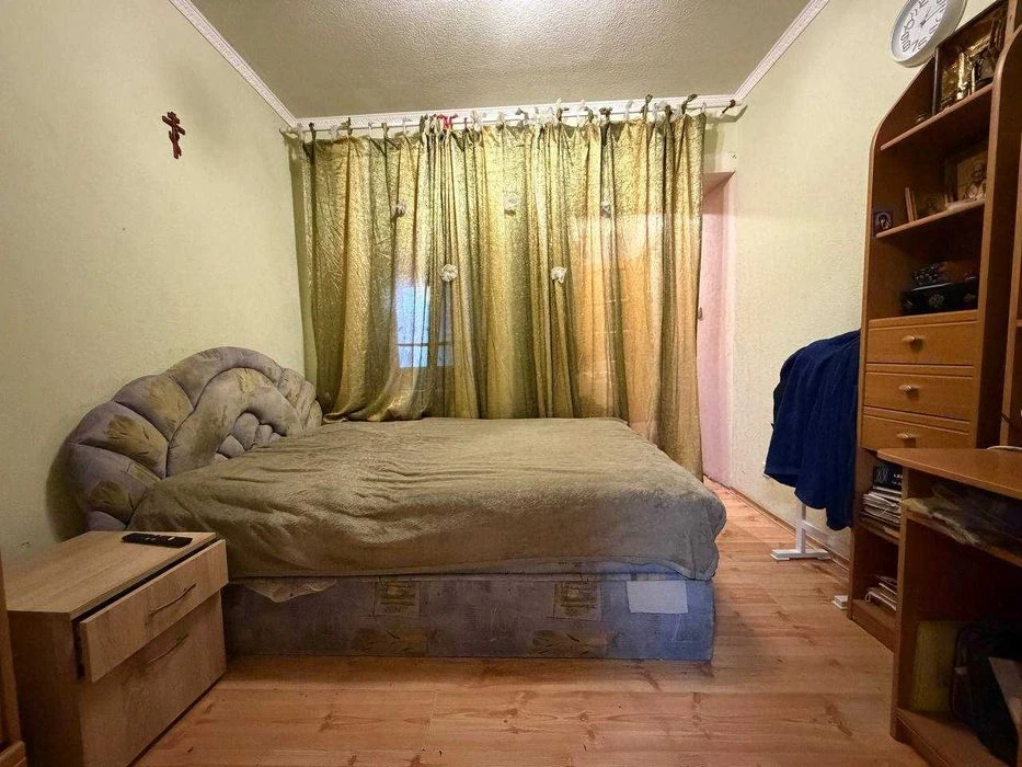 Buy an apartment with a private yard and parking in the center