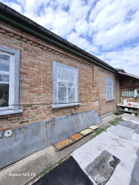 Продаж будинку в місті