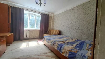 Selling a one-room studio apartment on Odesskaya Street for 11,500 USD.