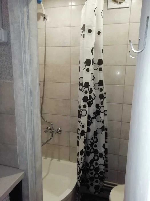 Selling a one-room studio apartment on Odesskaya Street for 11,500 USD.
