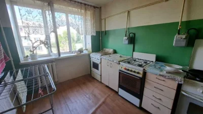 Selling a one-room studio apartment on Odesskaya Street for 11,500 USD.