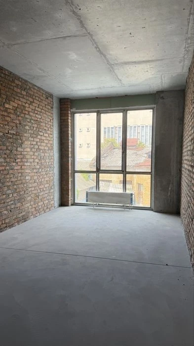 Sale of a new three-room apartment in a modern residential complex in Podol