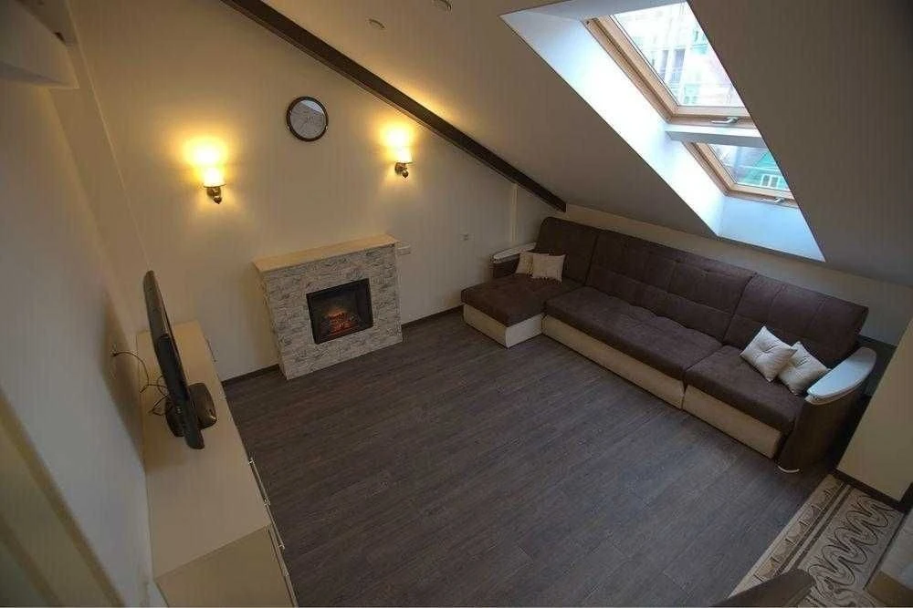 Bright 2-room apartment with attic for sale in