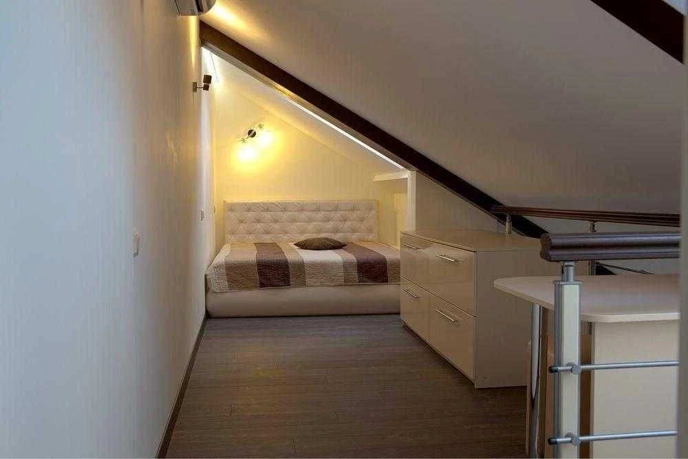 Bright 2-room apartment with attic for sale in